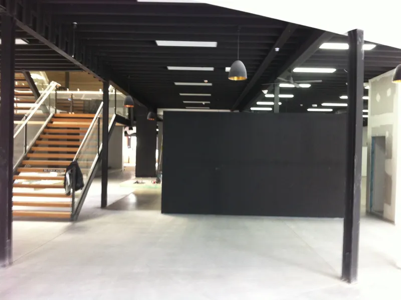 Camperdown commercial fit-out: open-plan floor with a new steel staircase
