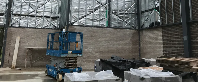 College building: steel-framed walls and roof structure