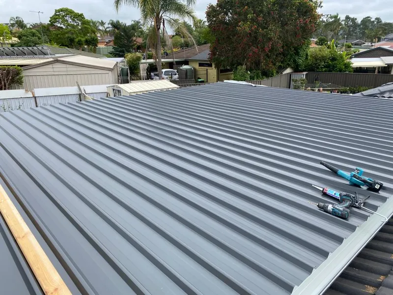 Finished metal roof over the new pergola
