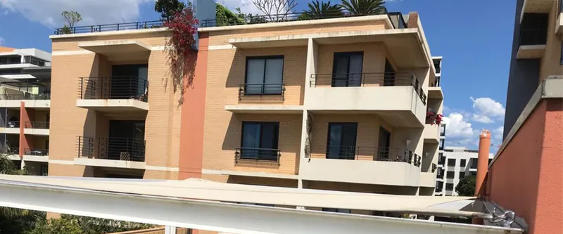 Redfern apartment building: upper-level balconies